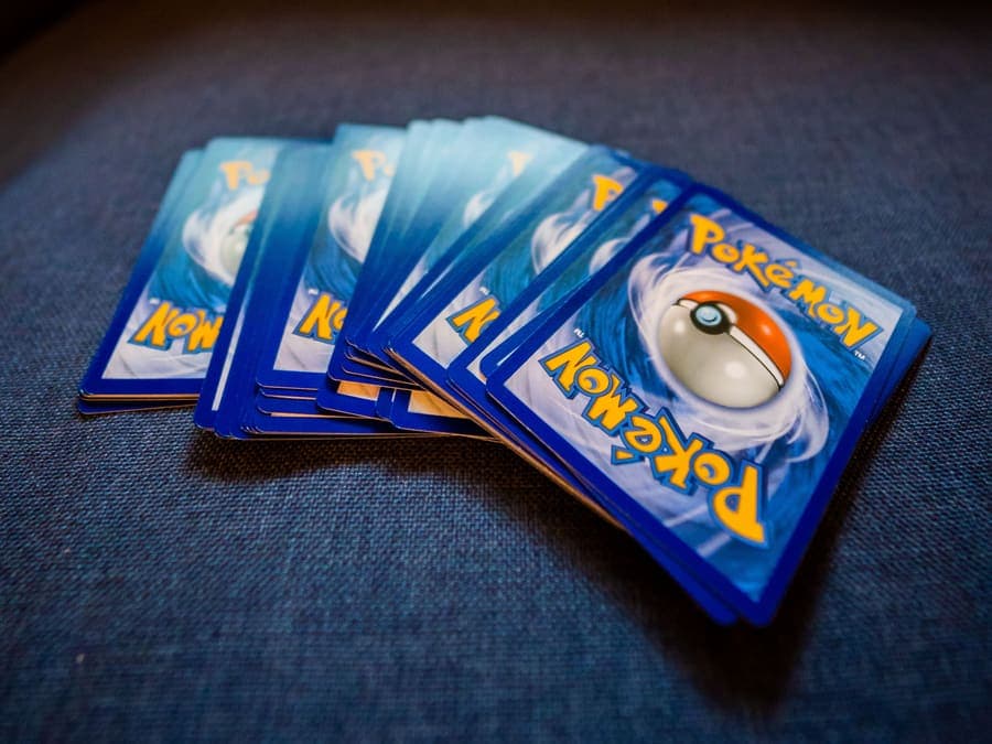 Sealed packs of collectible trading cards arranged on a table
