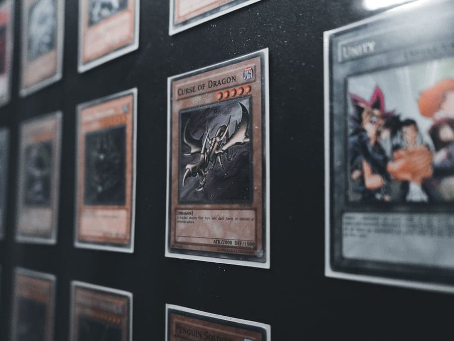 Graded trading cards shown inside a clear display case